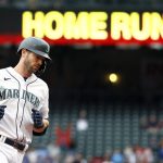SEATTLE, WASHINGTON - SEPTEMBER 11: Mitch Haniger #17 of the Seattle Mariners rounds the bases after his two-run home run against the Arizona Diamondbacks during the first inning at T-Mobile Park on September 11, 2021 in Seattle, Washington. (Photo by Steph Chambers/Getty Images)