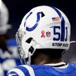 INDIANAPOLIS, INDIANA - SEPTEMBER 12: A detail of a 9/11/01 ribbon the back of Kwity Paye #51 of the Indianapolis Colts helmet prior to the game against the Seattle Seahawks at Lucas Oil Stadium on September 12, 2021 in Indianapolis, Indiana. (Photo by Michael Hickey/Getty Images)