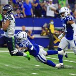 INDIANAPOLIS, INDIANA - SEPTEMBER 12: Seattle Seahawks wide receiver Tyler Lockett #16 makes a 69-yard touchdown reception against Julian Blackmon #32 of the Indianapolis Colts during the second quarter at Lucas Oil Stadium on September 12, 2021 in Indianapolis, Indiana. (Photo by Justin Casterline/Getty Images)