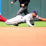 SEATTLE, WASHINGTON - SEPTEMBER 15: Xander Bogaerts #2 of the Boston Red Sox dives for a single hit by Ty France #23 of the Seattle Mariners during the sixth inning at T-Mobile Park on September 15, 2021 in Seattle, Washington. (Photo by Abbie Parr/Getty Images)