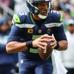 SEATTLE, WASHINGTON - SEPTEMBER 19: Quarterback Russell Wilson #3 of the Seattle Seahawks looks to throw the ball during the first half in the game against the Tennessee Titans at Lumen Field on September 19, 2021 in Seattle, Washington. (Photo by Abbie Parr/Getty Images)