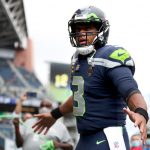 SEATTLE, WASHINGTON - SEPTEMBER 19: Quarterback Russell Wilson #3 of the Seattle Seahawks heads to the locker room at halftime in the game against the Tennessee Titans at Lumen Field on September 19, 2021 in Seattle, Washington. (Photo by Steph Chambers/Getty Images)