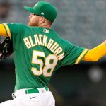 OAKLAND, CALIFORNIA - SEPTEMBER 21: Paul Blackburn #58 of the Oakland Athletics pitches against the Seattle Mariners in the top of the first inning at RingCentral Coliseum on September 21, 2021 in Oakland, California. (Photo by Thearon W. Henderson/Getty Images)
