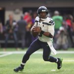 MINNEAPOLIS, MINNESOTA - SEPTEMBER 26: Russell Wilson #3 of the Seattle Seahawks looks to throw the ball during the first quarter in the game against the Minnesota Vikings at U.S. Bank Stadium on September 26, 2021 in Minneapolis, Minnesota. (Photo by David Berding/Getty Images)