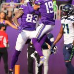 MINNEAPOLIS, MINNESOTA - SEPTEMBER 26: Tyler Conklin #83 and Adam Thielen #19 of the Minnesota Vikings celebrate a touchdown during the first quarter in the game against the Seattle Seahawks at U.S. Bank Stadium on September 26, 2021 in Minneapolis, Minnesota. (Photo by Adam Bettcher/Getty Images)