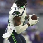 MINNEAPOLIS, MINNESOTA - SEPTEMBER 26: DK Metcalf #14 of the Seattle Seahawks catches the ball during the second quarter in the game against the Los Angeles Rams at U.S. Bank Stadium on September 26, 2021 in Minneapolis, Minnesota. (Photo by David Berding/Getty Images)