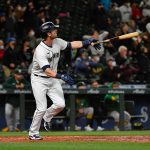 SEATTLE, WASHINGTON - SEPTEMBER 27: Mitch Haniger #17 of the Seattle Mariners hits a three run home run during the fourth inning against the Oakland Athletics at T-Mobile Park on September 27, 2021 in Seattle, Washington. (Photo by Alika Jenner/Getty Images)