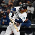 SEATTLE, WASHINGTON - SEPTEMBER 28: Jake Fraley #28 of the Seattle Mariners swings at a pitch during the second inning against the Oakland Athletics at T-Mobile Park on September 28, 2021 in Seattle, Washington. (Photo by Alika Jenner/Getty Images)