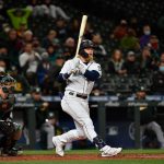 SEATTLE, WASHINGTON - SEPTEMBER 28: Jake Fraley #28 of the Seattle Mariners hits a two-run double during the fourth inning against the Oakland Athletics at T-Mobile Park on September 28, 2021 in Seattle, Washington. (Photo by Alika Jenner/Getty Images)