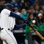 SEATTLE, WASHINGTON - SEPTEMBER 29: Abraham Toro #13 of the Seattle Mariners swings at a pitch during the fourth inning against the Oakland Athletics at T-Mobile Park on September 29, 2021 in Seattle, Washington. (Photo by Alika Jenner/Getty Images)