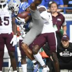 
              Memphis wide receiver Calvin Austin III (4) is brought down by Mississippi State cornerback Emmanuel Forbes after a reception during the first half of an NCAA college football game on Saturday, Sept. 18, 2021, in Memphis, Tenn. (AP Photo/John Amis)
            