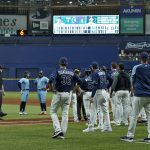
              Tampa Bay Rays and Toronto Blue Jays players stand on the field after Blue Jays pitcher Ryan Borucki hit Rays' Kevin Kiermaier with a pitch during the eighth inning of a baseball game Wednesday, Sept. 22, 2021, in St. Petersburg, Fla. (AP Photo/Chris O'Meara)
            