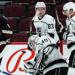 
              Los Angeles Kings goaltender Cal Peterson (40) makes a save on a shot by Arizona Coyotes' Liam O'Brien (38) as Kings' Cade McNelly (83) and Sean Walker (26) look on during the first period of a preseason NHL hockey game Monday, Sept. 27, 2021, in Glendale, Ariz. (AP Photo/Ross D. Franklin)
            