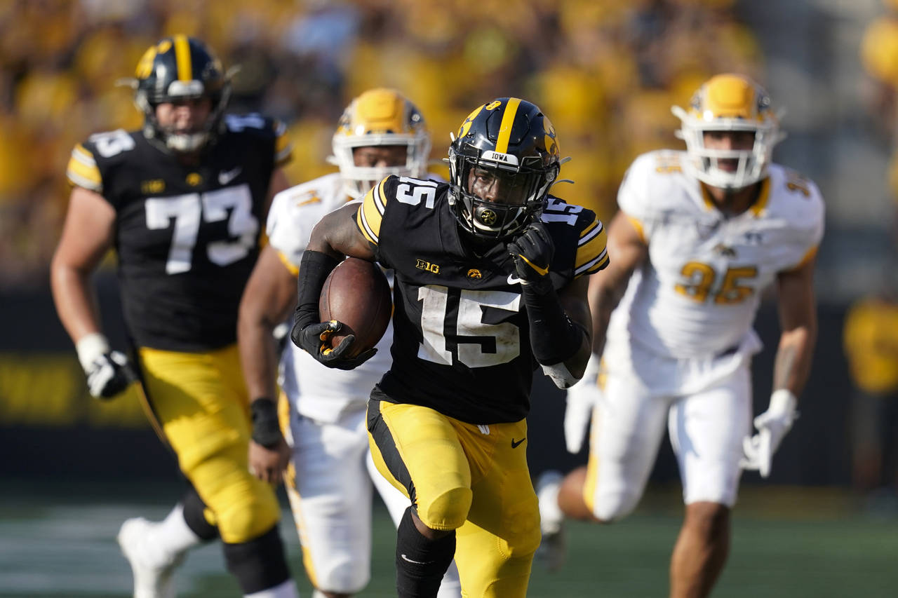 Green Bay Packers' Tyler Goodson runs during the first half of a