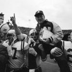 
              FILE - In this Nov. 25, 1971, file photo, Nebraska head coach Bob Devaney is carried off the field by his victorious players after they defeated Oklahoma 35-31 in an NCAA college football game in Norman, Okla., on Thanksgiving Day. The game on Thanksgiving 50 years ago is back in the spotlight as Nebraska and Oklahoma renew their rivalry on Saturday, Sept. 18, 2021. (AP Photo/File)
            