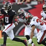 
              Atlanta Falcons tight end Kyle Pitts (8) gets away from Tampa Bay Buccaneers safety Mike Edwards (32), safety Antoine Winfield Jr. (31) and defensive back Ross Cockrell (43) after a catch during the first half of an NFL football game Sunday, Sept. 19, 2021, in Tampa, Fla. (AP Photo/Jason Behnken)
            