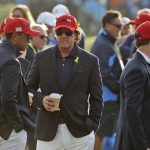 
              FILE - In this Sept. 30, 2018, file photo, Tiger Woods, left, and Phil Mickelson wait for the closing ceremony after Europe won the Ryder Cup on the final day of the 42nd Ryder Cup at Le Golf National in Saint-Quentin-en-Yvelines, outside Paris, France. Woods will be missng from the upcoming Ryder Cup, while Mickelson will serve as a vice-captain on the team. The pandemic-delayed 2020 Ryder Cup returns the United States next week at Whistling Straits along the Wisconsin shores of Lake Michigan.  (AP Photo/Matt Dunha, File)
            