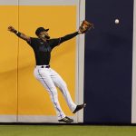 
              Miami Marlins right fielder Bryan De La Cruz can't make the catch on a double by Pittsburgh Pirates Ke'Bryan Hayes during the first inning of a baseball game Saturday, Sept. 18, 2021, in Miami. (AP Photo/Marta Lavandier)
            