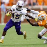 
              Tennessee Tech running back Jordan Brown (45) escapes from the grasp of Tennessee linebacker Morven Joseph (25) during the second half of an NCAA college football game Saturday, Sept. 18, 2021, in Knoxville, Tenn. Tennessee won 56-0. (AP Photo/Wade Payne)
            