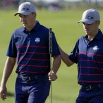 
              Team USA's Justin Thomas pats Team USA's Jordan Spieth on the back after putting during a foursome match the Ryder Cup at the Whistling Straits Golf Course Friday, Sept. 24, 2021, in Sheboygan, Wis. (AP Photo/Ashley Landis)
            