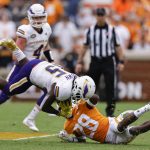
              Tennessee Tech running back Jordan Brown (45) is tackled by Tennessee defensive back De'Shawn Rucker (28) during the second half of an NCAA college football game Saturday, Sept. 18, 2021, in Knoxville, Tenn. Tennessee won 56-0. (AP Photo/Wade Payne)
            
