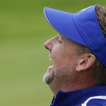 
              Team Europe's Ian Poulter laughs on the 11th hole during a practice day at the Ryder Cup at the Whistling Straits Golf Course Tuesday, Sept. 21, 2021, in Sheboygan, Wis. (AP Photo/Jeff Roberson)
            