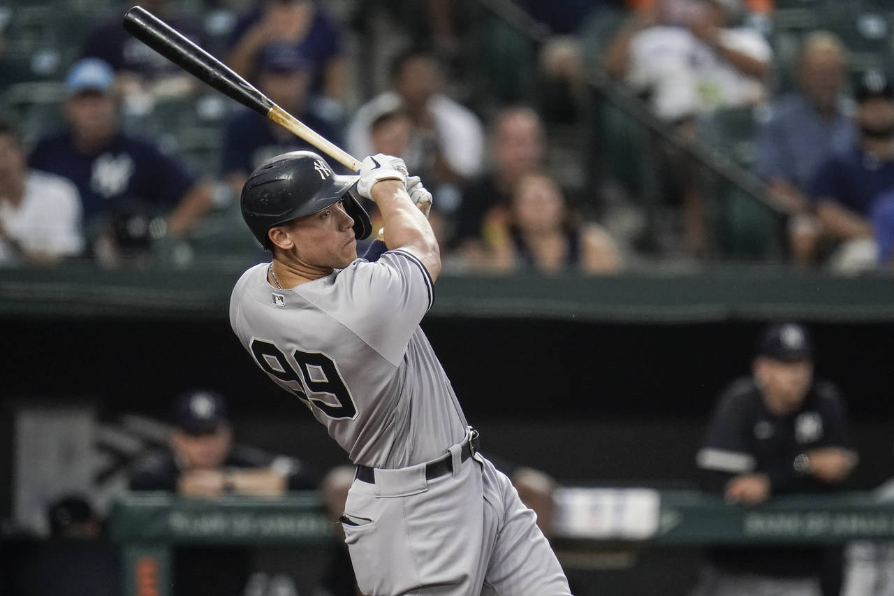 New York Yankees' Aaron Judge connects for a two-run home run off Baltimore Orioles starting pitche...
