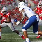 
              Ohio State running back TreVeyon Henderson, left, cuts upfield against Tulsa defensive back LJ Wallace during the first half of an NCAA college football game Saturday, Sept. 18, 2021, in Columbus, Ohio. (AP Photo/Jay LaPrete)
            