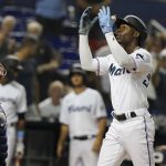 
              Miami Marlins' Jazz Chisholm Jr. gestures to the crowd after hitting his second solo home run of the game during the fifth inning of a baseball game against the Washington Nationals, Monday, Sept. 20, 2021, in Miami. (AP Photo/Marta Lavandier)
            