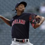 
              Cleveland Indians' pitcher Triston McKenzie (24) throws against the Minnesota Twins during the first inning of the first baseball game of a doubleheader Tuesday, Sept. 14, 2021, in Minneapolis. (AP Photo/Stacy Bengs)
            