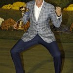 
              FILE - Europe's Ian Poulter celebrates with the trophy after winning the Ryder Cup PGA golf tournament at the Medinah Country Club in Medinah, Ill., in this Sept. 30, 2012, file photo. Poulter is 14-6-2 in his previous six Ryder Cups. He is 5-0-1 in singles. He has been on five winning teams and only one loser. (AP Photo/Chris Carlson, File)
            