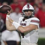 
              South Carolina quarterback Luke Doty (4) throws a pass against Georgia during the first half of an NCAA college football game Saturday, Sept. 18, 2021, in Athens, Ga. (AP Photo/Butch Dill)
            