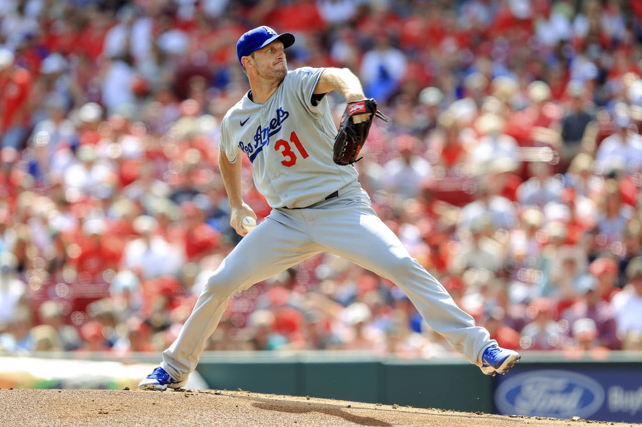 Los Angeles Dodgers' Max Scherzer throws during the first inning of a baseball game against the Cin...