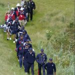 
              Team USA's Brooks Koepka and other team USA members walk off the 10th tee during a practice day at the Ryder Cup at the Whistling Straits Golf Course Wednesday, Sept. 22, 2021, in Sheboygan, Wis. (AP Photo/Charlie Neibergall)
            