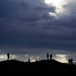 
              Fans overlook the 14th green during a four-ball match the Ryder Cup at the Whistling Straits Golf Course Friday, Sept. 24, 2021, in Sheboygan, Wis. (AP Photo/Charlie Neibergall)
            
