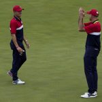 
              Team USA assistant captain Jim Furyk applauds Justin Thomas after the Ryder Cup matches at the Whistling Straits Golf Course Sunday, Sept. 26, 2021, in Sheboygan, Wis. (AP Photo/Jeff Roberson)
            