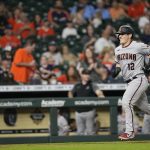 
              Arizona Diamondbacks' Daulton Varsho (12) runs down the third base line after hitting a two-run home run against the Houston Astros during the 10th inning of a baseball game Saturday, Sept. 18, 2021, in Houston. (AP Photo/David J. Phillip)
            