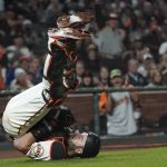 
              San Francisco Giants catcher Curt Casali falls backward after catching an out in foul territory hit by San Diego Padres' Fernando Tatis Jr. during the eighth inning of a baseball game in San Francisco, Monday, Sept. 13, 2021. (AP Photo/Jeff Chiu)
            