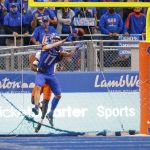 
              Boise State wide receiver Davis Koetter (17) reaches back for the ball on a touchdown reception against Oklahoma State during the first half of an NCAA college football game Saturday, Sept. 18, 2021, in Boise, Idaho. (AP Photo/Steve Conner)
            