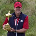 
              Team USA captain Steve Stricker poses with the trophy after the Ryder Cup matches at the Whistling Straits Golf Course Sunday, Sept. 26, 2021, in Sheboygan, Wis. (AP Photo/Ashley Landis)
            