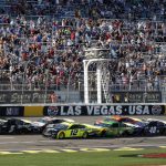 
              Drivers get the green flag at the start of a NASCAR Cup Series auto race at Las Vegas Motor Speedway, Sunday, Sept. 26, 2021, in Las Vegas. (AP Photo/Steve Marcus)
            