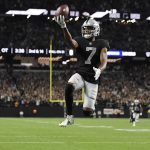 
              Las Vegas Raiders wide receiver Zay Jones (7) celebrates after scoring a game winning touchdown against the Baltimore Ravens during overtime in an NFL football game, Monday, Sept. 13, 2021, in Las Vegas. (AP Photo/David Becker)
            