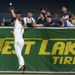 
              San Diego Padres right fielder Wil Myers makes the catch over the wall for the out on San Francisco Giants' Steven Duggar during the eighth inning of a baseball game Tuesday, Sept. 21, 2021, in San Diego. (AP Photo/Gregory Bull)
            