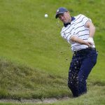 
              Team USA's Jordan Spieth hits from a bunker on the first hole during a practice day at the Ryder Cup at the Whistling Straits Golf Course Tuesday, Sept. 21, 2021, in Sheboygan, Wis. (AP Photo/Charlie Neibergall)
            