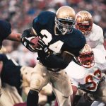 
              FILE - In this Nov. 13, 1993, file photo, Notre Dame back Ray Zellars (34) heads upfield during an NCAA college football game against Florida State in South Bend, Ind. The Irish won the game 31-24 and went on to lose the following week to Boston College, losing out on a national title. (AP Photo/Joe Raymond, File)
            