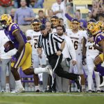
              LSU defensive end Andre Anthony (3) returns a Central Michigan fumble for a touchdown during the first quarter of an NCAA college football game in Baton Rouge, La,. Saturday, Sept. 18, 2021. (AP Photo/Derick Hingle)
            