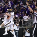 
              California's Jake Tonges (85) celebrates his touchdown reception with Gavin Reinwald against Washington in the first half of an NCAA college football game Saturday, Sept. 25, 2021, in Seattle. (AP Photo/Elaine Thompson)
            