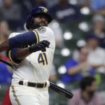 
              Milwaukee Brewers' Jackie Bradley Jr. swings and misses a pitch during the eighth inning of a baseball game against the St. Louis Cardinals, Monday, Sept. 20, 2021, in Milwaukee. (AP Photo/Aaron Gash)
            