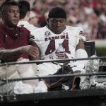 
              South Carolina linebacker Sherrod Greene (44) is taken off the field on a cart after an injury during the team's NCAA college football game against Georgia on Saturday, Sept. 18, 2021, in Athens, Ga. (Joshua Boucher/The State via AP)
            