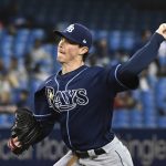
              Tampa Bay Rays' Ryan Yarbrough pitches in the fourth inning of a baseball game against the Toronto Blue Jays in Toronto on Monday, Sept. 13, 2021. (Jon Blacker/The Canadian Press via AP)
            